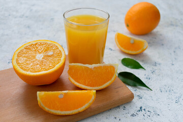 Freshly orange juice on a white background.