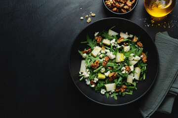 Salad with blue cheese, arugula and nuts