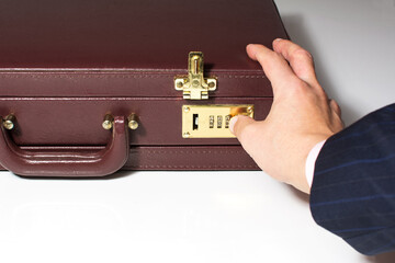 24-hour briefcase with hand that releases the lock