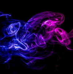 Colored smoke on black background