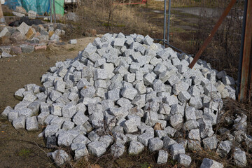 A pile of granite stones for construction.
