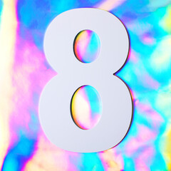 Number eight on the holographic textured background. Colorful reflective fabric. Celebration, holidays, fashion concept. Flat lay.