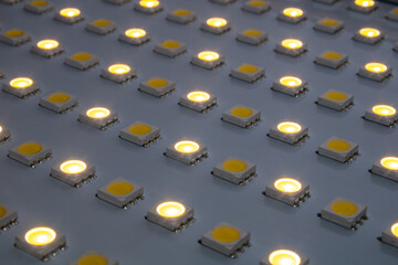 LED bulbs on the luminaire. Background on the theme of saving electricity using LED bulbs.