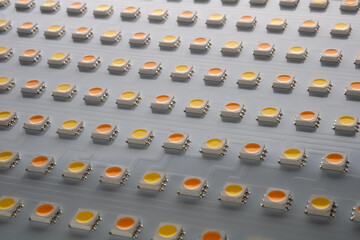 LED bulbs on the luminaire. Background on the theme of saving electricity using LED bulbs.