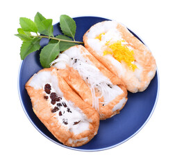 Thai desserts or Thai pancake (kha-nom-thang-taek) with coconut and corn filling