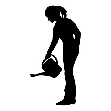 Gardener Or Farmer Girl Silhouette Watering Plants From A Watering Can In The Garden