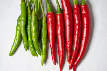 Red and green chili pepper isolated on white background