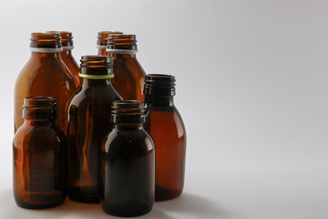 Capless brown bottles of medidcine