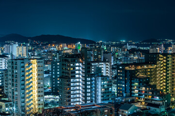 日本の地方都市、福岡市愛宕神社から望む夜景の美しいビル街の灯りと街並み