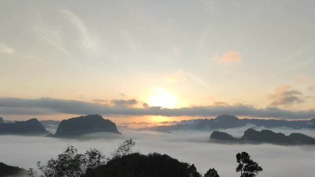 Time lapse Natural beautiful place, sea mist, morning mist, view from high mountains surrounded by trees.