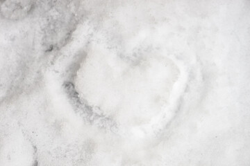 Heart shaped form on snow