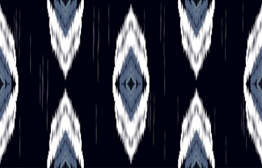 classic blue and white ikat seamless pattern Geometric ethnic oriental  traditional embroidery style.Design for background,carpet,mat,wallpaper,clothing,wrapping,Batik,fabric,Vector illustration.