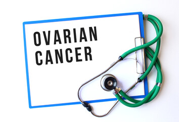 OVARIAN CANCER text on a medical folder and stethoscope on white background