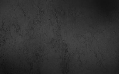 Fototapeta na wymiar rough dark black concrete or cement surface background with space for text. rustic abstract grunge decorative gradiented green stucco wall background.