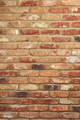 Old red orange dark bricks background, old wall in the house