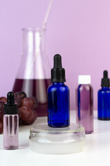 Organic bio grape cosmetics. Extract, grape seed oils, serum. Abstract cosmetic laboratory.