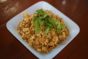 Pork Larb with Basil in dish