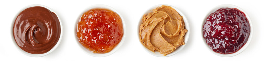 Set of sweet sauces in round dish isolated on white background