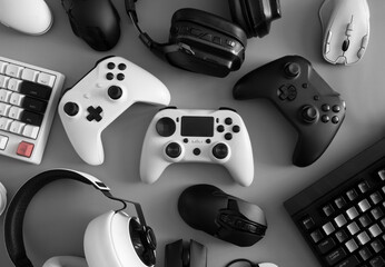 gamer work space concept, top view a gaming gear, mouse, keyboard, joystick and headset. © ekkaphan