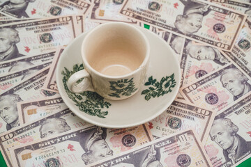 cup of coffee with money