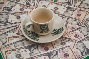 cup of coffee with money