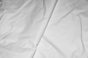 pleated white cotton material. texture or background
