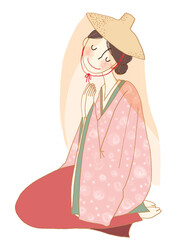 着物を着て祈る女性。