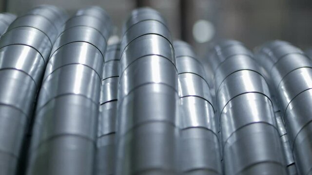 Close-up of the winding of a high-voltage electric cable on a coil in production. The production of the cable. 