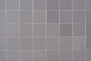 background gray ceramic tiles laying without pattern wall