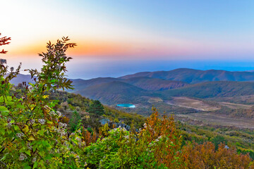 sunrise over the hills and the sea in crimea on an autumn morning