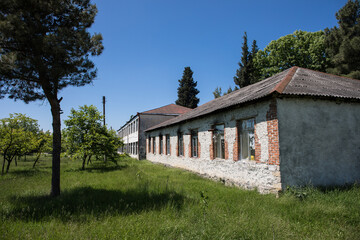 Obraz premium Picture of beautiful village house with garden. Azerbaijan village in summer time