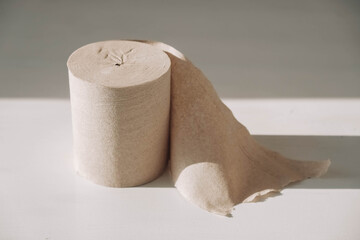 Paper roll on the table. Copy, empty space for text