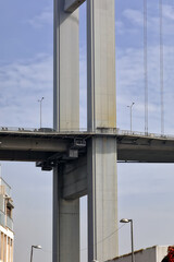 Bosporus bridge support over residential house. Istanbul, Turkey.