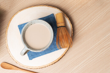 Milk put in the cup and put on the table