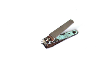 Old nail cutter on white background