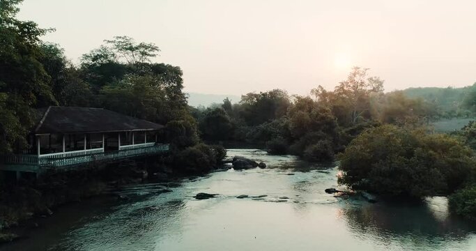 Aerial of River flowing through Thailands Jungle