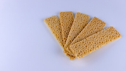 fitness crispbreads lie in a white plate, isolated