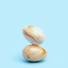 Stone texture Easter eggs balance. Minimal style composition, Spring celebration concept.