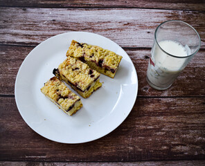 Baked cake with glass of milk