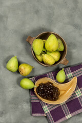 Fresh figs with ingredients on the table.