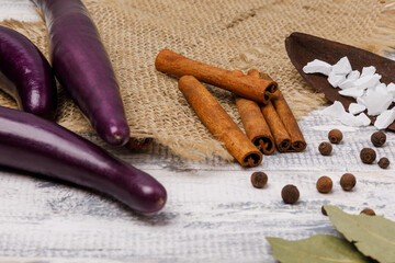 Purple chinese  eggplants and bay leafs