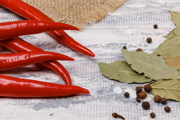 Red chili peppers and bay leafs