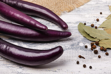 Purple chinese  eggplants and bay leafs