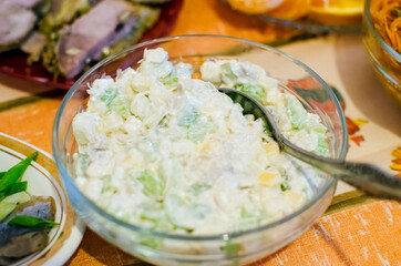 Homemade vegetable salad with mayonnaise.