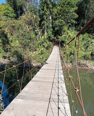 The footbridge across the waterfall