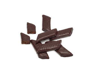 Top view of chocolate sweets filled with biscuit crumbs and condensed milk and cocoa isolated on white background