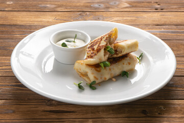 Pancakes stuffed with chicken breast and mozzarella cheese