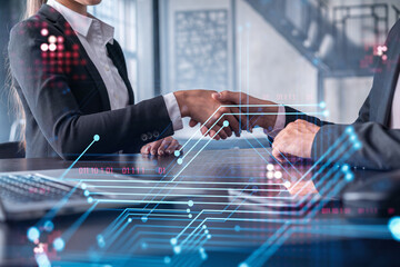 Handshake of two businesspeople as agreement concept to develop a new software to improve service at a company. Technological icons. Woman in business.