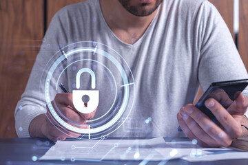 A businessman in casual wear signing the contract to prevent probability of risks in cyber...