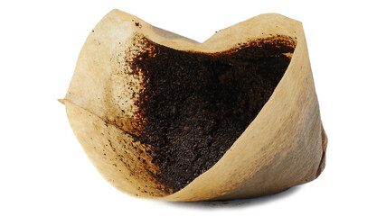 Used ground coffee in a filter isolated on white background, side view